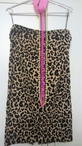 Adult Female Costumes to Hire - Animal print skirt, necklaces, headband)